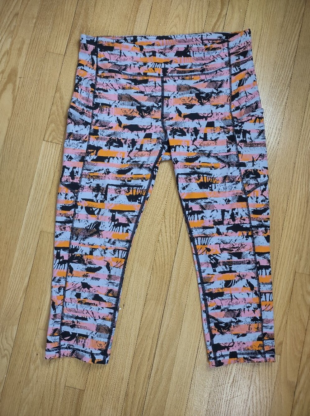 Lululemon Size 12 Cropped Workout Leggings Pink Orange Abstract Print